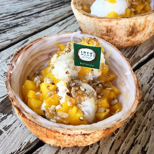 Vegan coconut ice cream with fresh coconut, mango, sticky rice and toasted rice at Coco Mama in Boracay