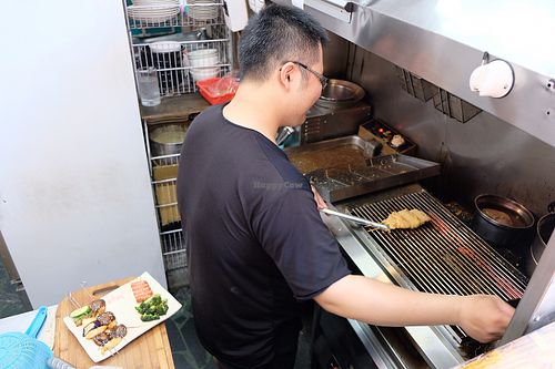 staff preparing grilled veggies  at Lǜ ShíDài 綠時代 - Green Age in Kaohsiung