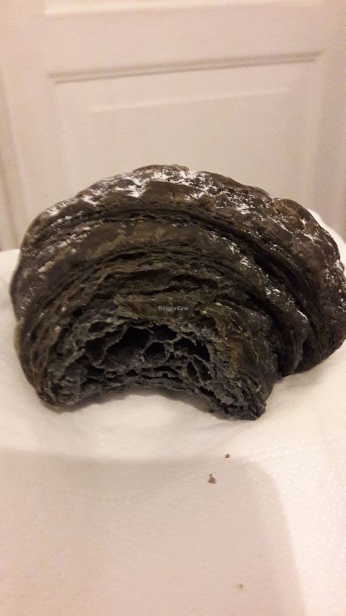 Charcoal croissant at Enoteca Radici in Bologna