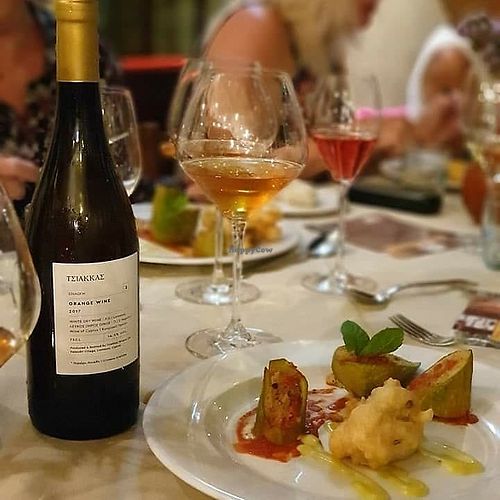 Stuffed Zucchini and Zucchini blossoms
with cus-cus, caramelized dry fruits,
cardamon zest and roasted almonds,
accompanied with light basil and tomato
sauce at O'Vrakas Taverna in Limassol