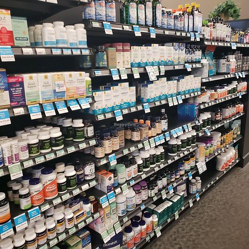 Aisles of supplements at Good Earth Natural Foods in Sandy