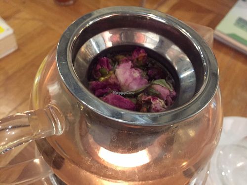 Rose buds in teapot  at Kubrick in Kowloon