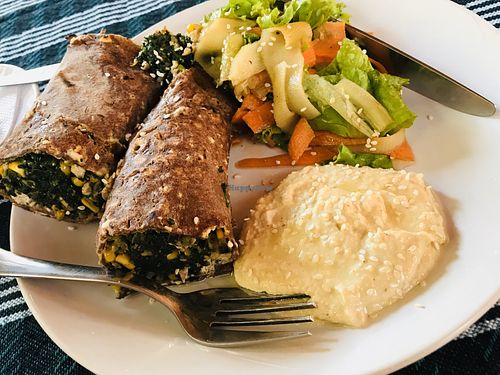 Spinach rolls with hummus  at Maya's Organic Garden in Arambol