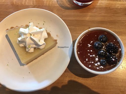 Key Lime Pie with coconut chantilly and Coconut & Chia Seed Flan with caramel, mixed berries  at True Food Kitchen in Fairfax