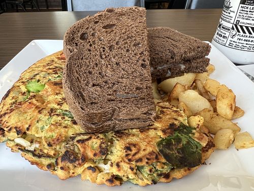 Vegan omelette with vegan cheese and toast  at My Diner in Melrose