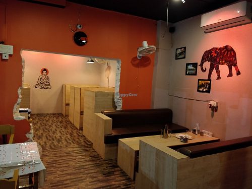 Restaurant interior at Rose Apple Cafe in Bodhgaya