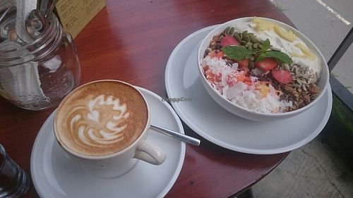 Cappuccino and yogurt fruit bowl at Lazy Cats  in Ubud