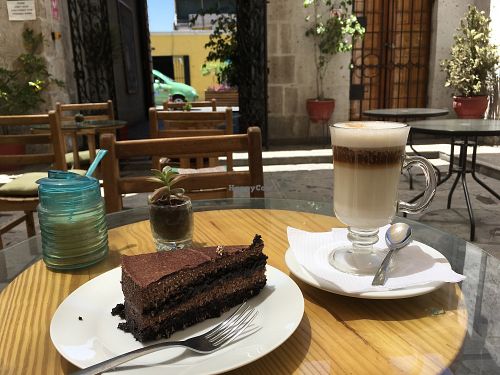 vegan cake and cappuccino at Omphalos in Arequipa