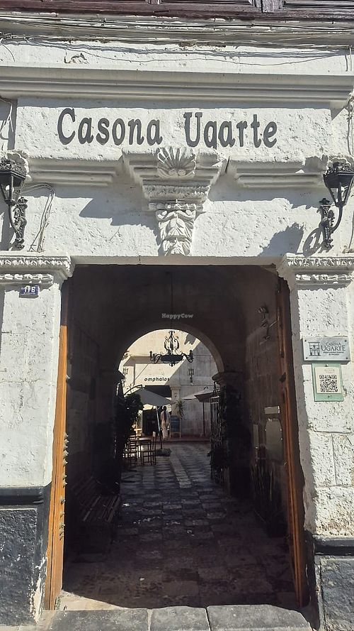 Look for this doorway from outside. Restaurant is in the patio, ground floor. at Omphalos in Arequipa