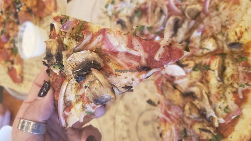Vegan pizza. Go easy on the daiya cheese. It isn't the best vegan cheese but it will do in a pinch! at Pieology in Menifee