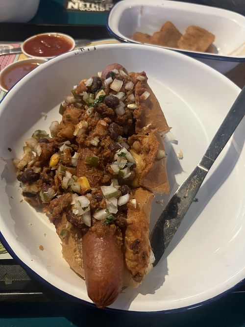 Forgot to take a photo so this is a cut up chilli doggy  at Netherworld in Fortitude Valley