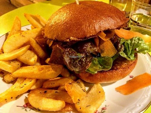 The vegan "Aubergine" (eggplant) burger and fries. at Aux Petits Oignons in Aix-en-provence