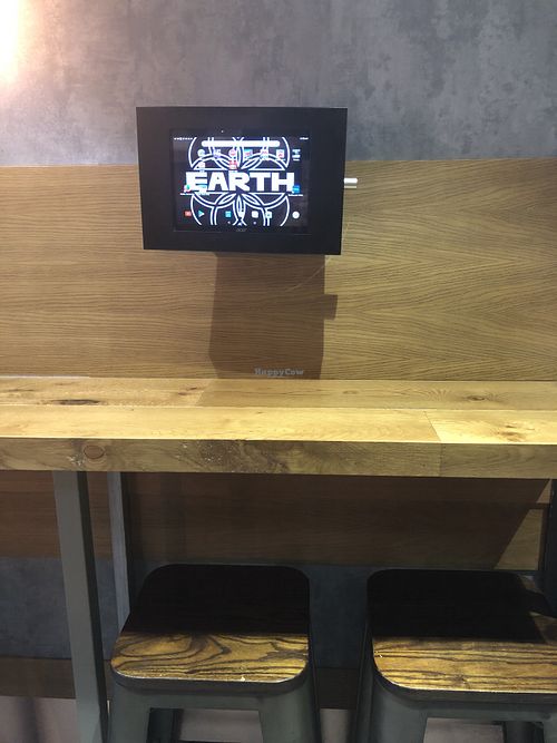 Cool I pads to play on  at Earth Restaurant & Takeaway in Petersfield