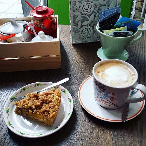 Soy latte and vegan mango crumble pie for breakfast, so so good!  at Green Conga - Biomarket and Cafeteria in Gran Canaria