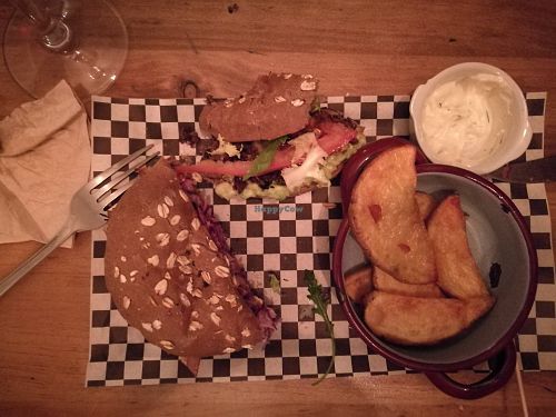 Vegan sandwich (partially already eated) at Quinoa Arago Vegetaria in Barcelona