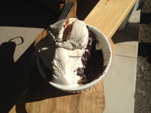 Chocolate brownie with coconut ice cream. Gluten-free! at Planet Vegan in Sunshine Coast