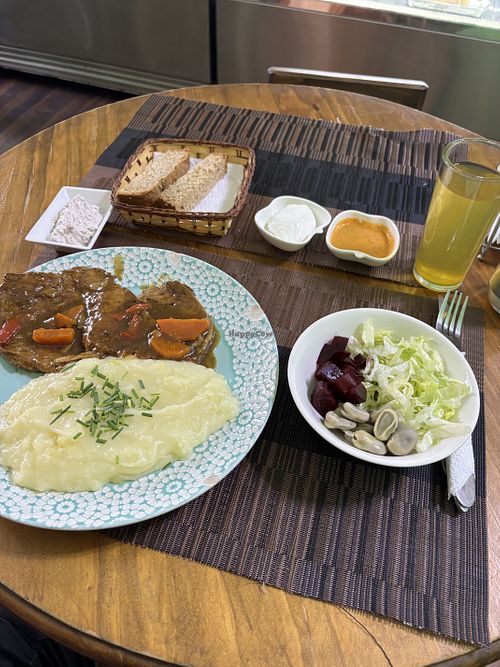 Seitan, potatoes, salad, bread, tea, and dessert!  at Govinda's - Diego Portales in Santiago