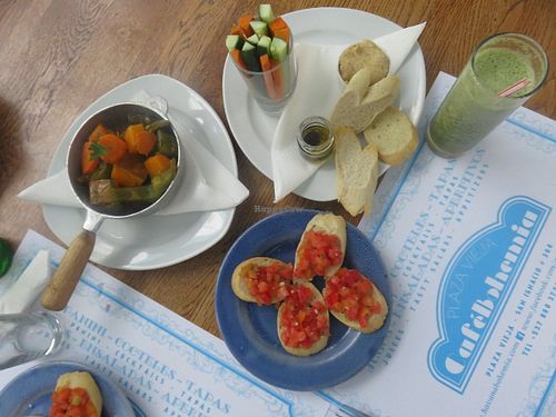 Bruschetta, roasted root vegetables, crudité, mint& pineapple fresh juice. at Bohemia Cafe in Havana