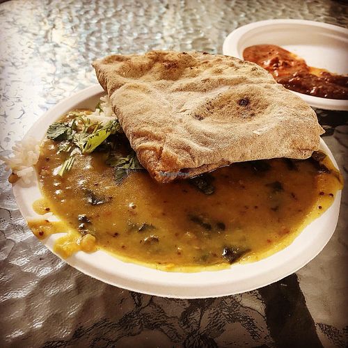 Spinach dal with rice and chapati bread at Hariprasad Samosa & Curry in Krakow