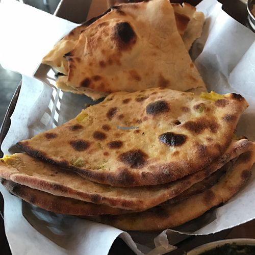 Aloo Pratha (front); naan in rear  at Taj Mahal in Scottsdale