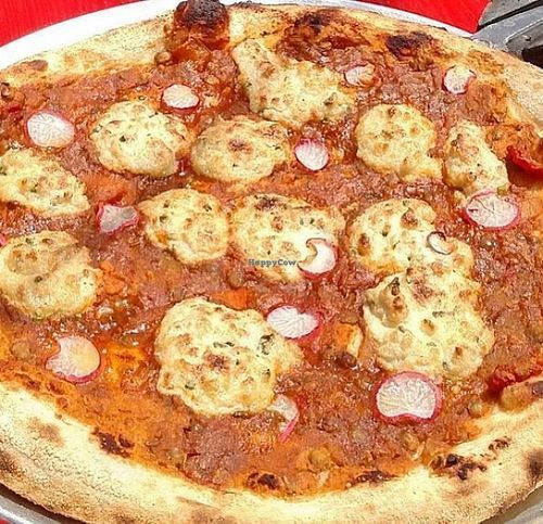 Apricot lentil chili base topped with chive cashew vegan mascarpone and local radishes.  at Pompieri Pizza in Durham