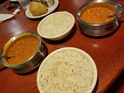 This was the dal tadka (left) and vegetable jalfrezi (right) that my mother and I shared; both came with bowls of steamed rice. at Cumin Indian Cuisine in Kalamazoo
