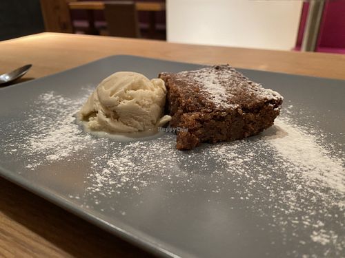 Vegan walnut cake with ice cream at Organic Pizza in Salzburg
