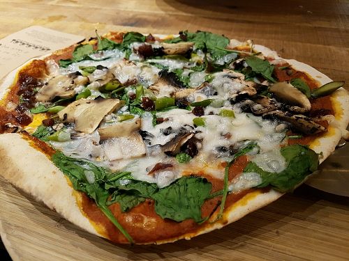 The Hazel Nutter pizza (with extra peppers) from the vegan menu. Topped with vegan mozzarella.  at The Stable in Exeter