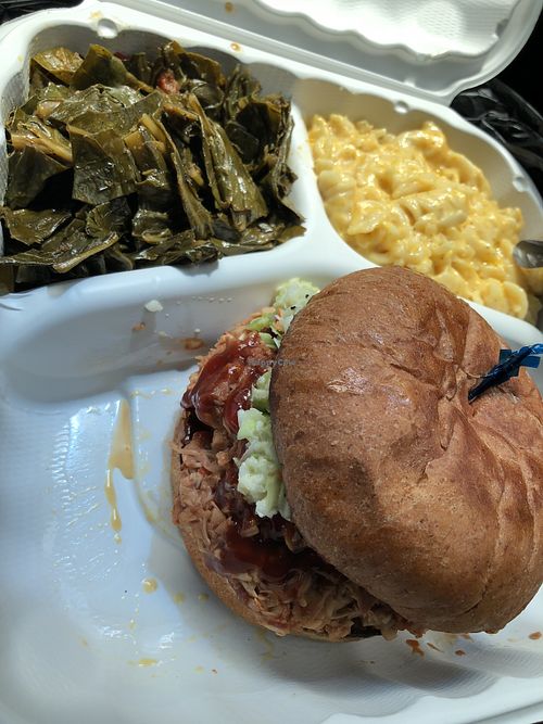Jerked chicken sandwich, collards, and Mac n cheese at Soul Good Vegan Cafe in Durham