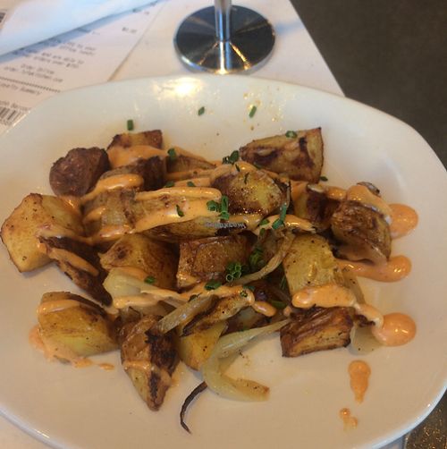 Roasted potatoes topped with chipotle sauce  at LYFE Kitchen in Valencia