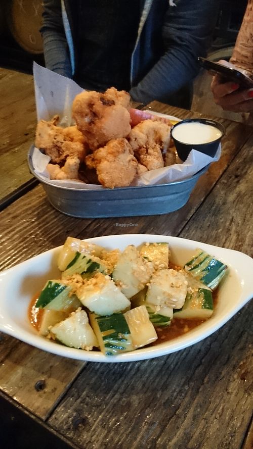 Buffalo cauliflower wings & the spicy cucumber salad at Second District Brewing in Philadelphia