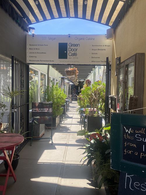 Lush Alleyway to Green Door  at Green Door Cafe in La Jolla