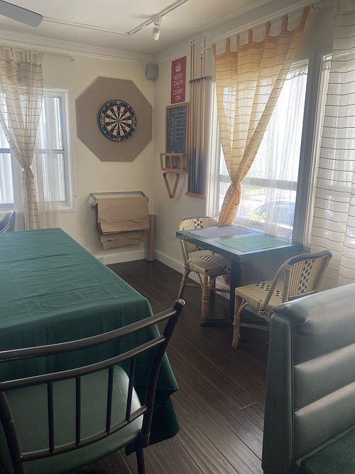 Small Interior w/Darts and Seating  at Green Door Cafe in La Jolla