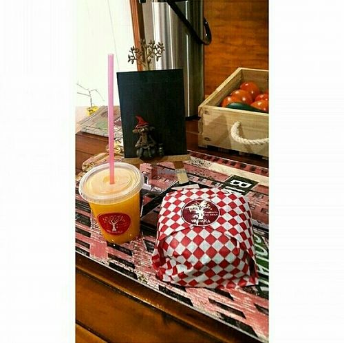 Veggie burger and natural juice at Wadaka Bites in Bogota