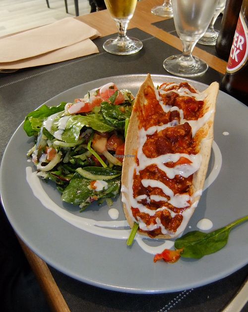 Chilli sin carne in a homemade tortilla with a garnish and sumptuous salad at Vegan Joe's  in Loule
