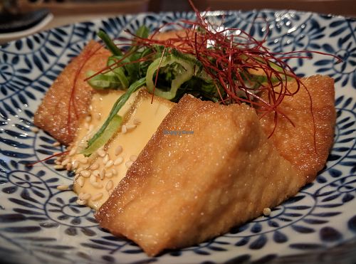 Tofu "steak" is pretty soft. Skin is like inari sushi style. Good in leftover chilli sauce. at LBK Craft in Nara
