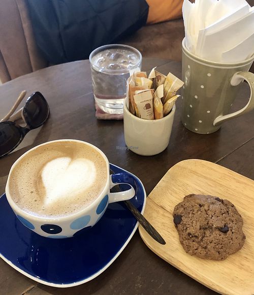 Latte with coconut milk + gluten free almond cookie at Banboran Cafe in Phuket