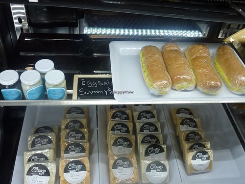 Deli case, vegan cheeses, sandwiches at The Very Good Butchers in Victoria