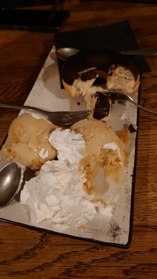 Choc donut with snickers ice cream: ice cream is amazing but donut too dry :( at SIGGIS v/gan dine & co. in Munich