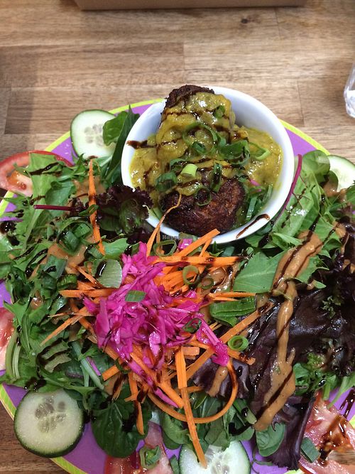 Vegan balls, salad and curry sauce at WassupDOG in Fremantle