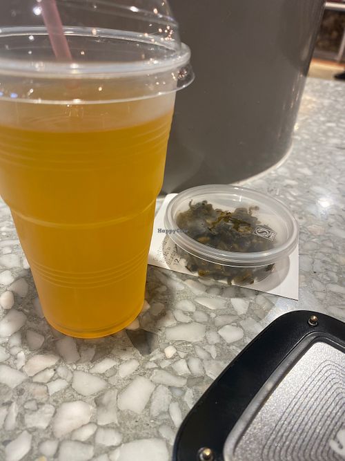 Homemade tea and spicy Takana side dish  at Yatai Ozeki in Sydney