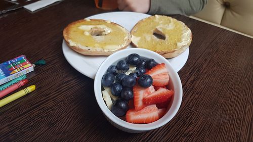 Toasted bagel with fresh fruit at Moose Coffee in Manchester
