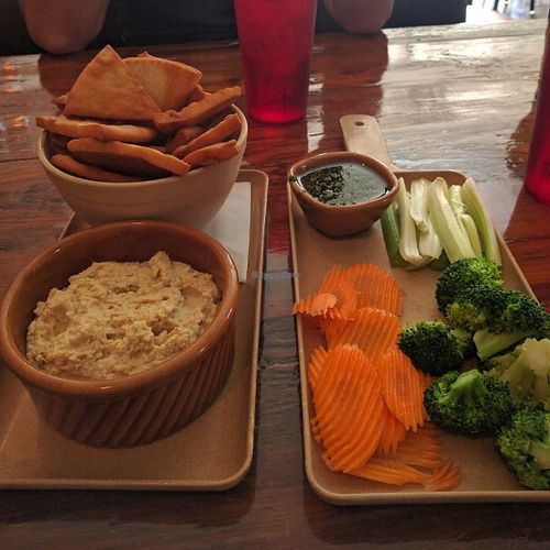 Hummus with pita and veggies. at Roots Pizza in Chicago