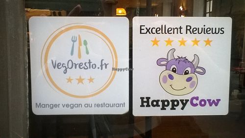 stickers on the door at La Palanche d'Aulac in Paris