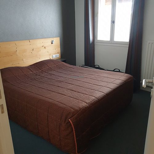 Double bedroom as part of a family suite at Hotel de l'Europe in Le Monetier-les-bains