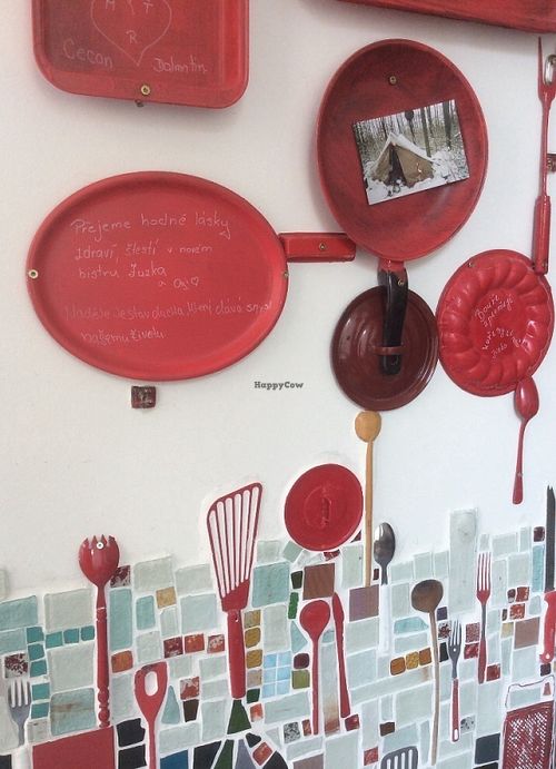 Kitchen utensils used as functional art. at Kuchařky bez Domova in Prague