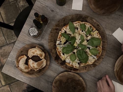 Vegan empanadas and pizza  at La Matatena Pizzeria in Oaxaca
