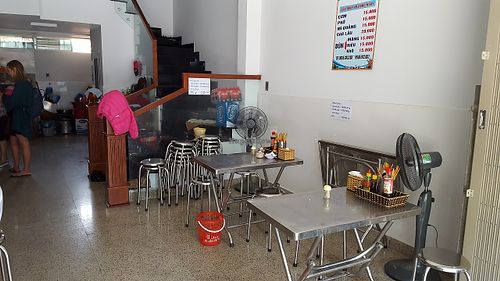 Tables and seating area at Tu An in Da Nang