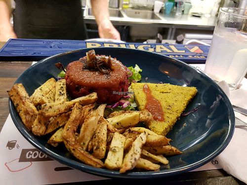 Beetroot burger with polenta and fries  at Marta's Veggie Fusion in Split