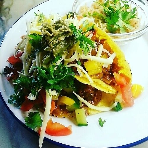 Pulled York and jackfruit in a smokey bow sauce serves with tavo's, salas, cheeze & guaco... at Hygge Food in Glasgow